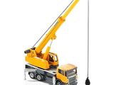 a toy truck with a crane attached to it ' s back