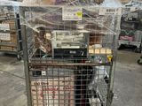 a cart with a lot of items in it on the street