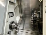 a machine that is sitting inside of a machine shop
