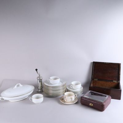 a lot of white dishes and cups on the table