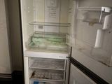 an open refrigerator with a lot of food inside of it