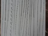 a piece of paper with writing on it sitting on a table
