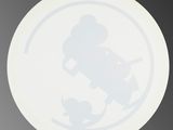 a white plate with a picture of a person on a skateboard in the middle of it