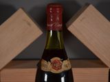 a bottle of wine that is sitting on a table