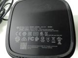 a small black device that is sitting on a table