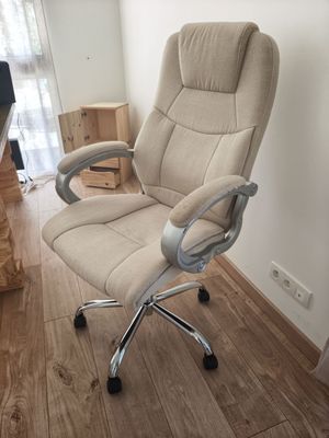a chair that is sitting in the corner of a room
