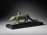 an egyptian bronze figurine of a rat