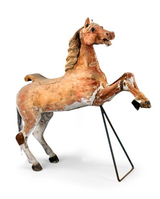 statue of a horse on a stand on a white background