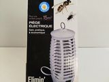 a close up of a box of electric insect traps on a table
