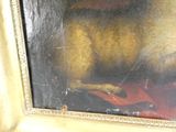 une photo d'un tableau représentant un chien avec une couverture rouge