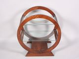 an image of a wooden display case with glass shelves on it