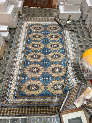 a rug on the floor in the middle of a room