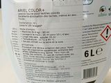 an image of a bottle of liquid on a table