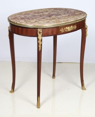 an image of a small table with a marble top on a white floor