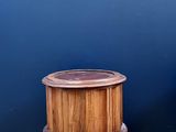 an image of a wooden box sitting on top of a hard wood floor