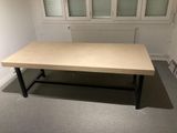 a table that is sitting in the middle of a room