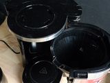 a coffee maker that is sitting on a table