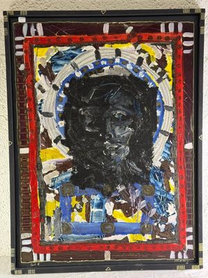 une image représentant une peinture du visage d'un homme sur un mur