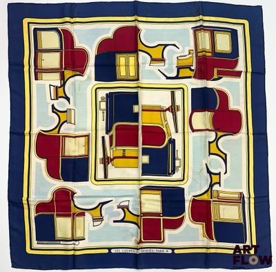 une photo d'un foulard carré sur lequel figure l'image d'un train