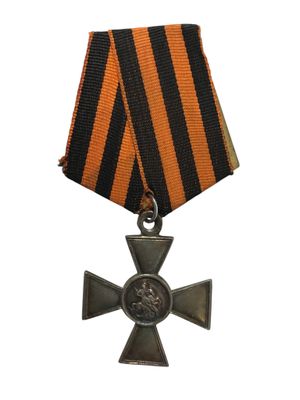 une médaille rayée d'orange et de noir, sur laquelle figure une croix