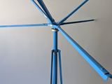 an image of a blue metal sculpture on a stand