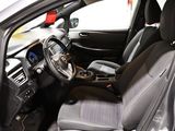 the interior of a car with a steering wheel and a dashboard