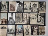 many pictures of old buildings on display on the wall