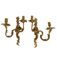 Paire d'appliques de style Louis XV en bronze doré.