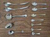 a lot of spoons and spoon spoons on the table