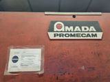 an old red suitcase with a sticker that says canada promcam on it