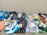 a pile of clothing that is on a table