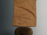 a bag and a skateboard sitting on a table