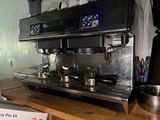 a coffee machine that is sitting on a table
