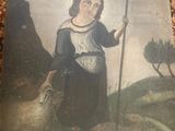 un vieux tableau représentant une femme avec un bâton et un mouton