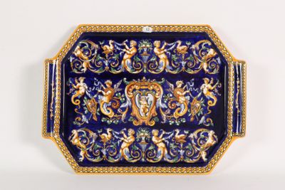 an image of a blue and gold plate with a design on it