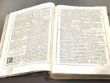 an open book that is sitting on a table