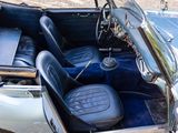 an image of an old car with a leather seat and dashboard
