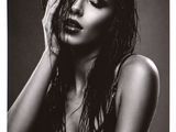 black and white photograph of a woman with wet hair posing for a picture