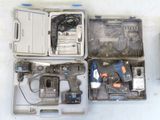 a tool box with a drill, hammer, and other tools in it