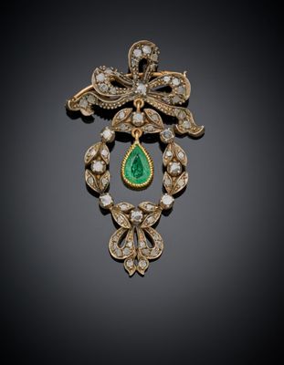 une broche en émeraude et diamants