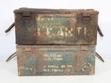 two old metal boxes stacked on top of each other