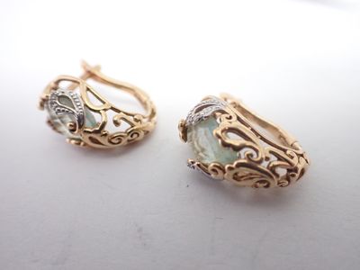 Paire de dormeuses en or et pierres, poids 1g - Photo 1