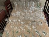 a lot of empty wine glasses on the table