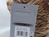 a small basket with a tag on it