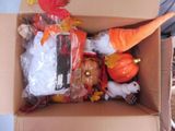 a cardboard box with a bunch of items inside of it