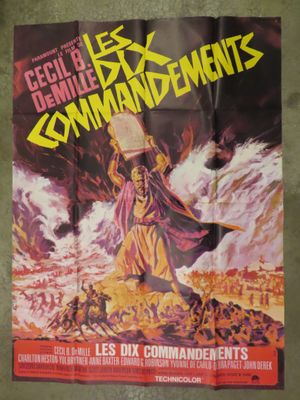an old movie poster of a man holding a hammer in front of a crowd