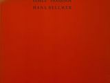 un livre orange avec une inscription noire sur la couverture