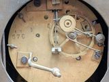 a clock that is sitting on top of a table