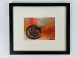 framed painting of a black and orange abstract painting with a white background