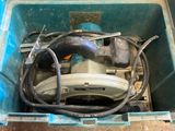 a blue box with a bunch of wires inside of it